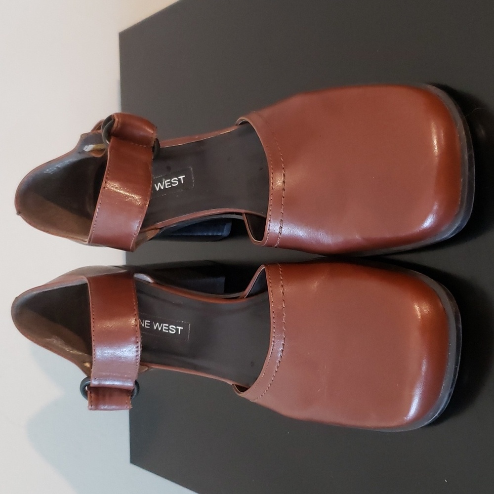 Nine West cognac color shoes with ankle strap.